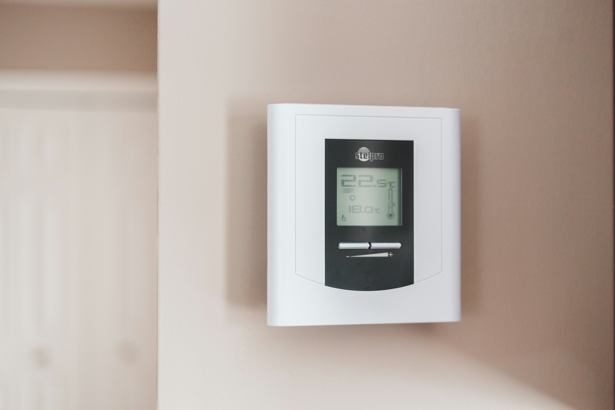 Smart thermostat controlling temperature-dependent automations